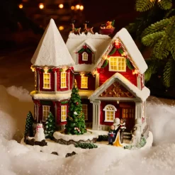 KAEMINGK Villaggio Di Natale Luminoso-Casa del Villaggio di Natale illuminata, musicale e animata a pile (H23 cm) Camden Street