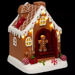 JJA Villaggio Di Natale Luminoso-Casetta luminosa, musicale e animata a pile (H16 cm) Allegro Pan di Zenzero