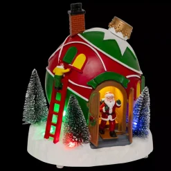 JJA Villaggio Di Natale Luminoso-Villaggio di Natale musicale e animato a pile (H22 cm) Capanna di Babbo Natale