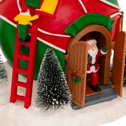 JJA Villaggio Di Natale Luminoso-Villaggio di Natale musicale e animato a pile (H22 cm) Capanna di Babbo Natale